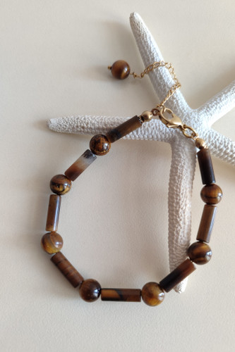 دستبند چشم ببر لوله ای و گرد سایز 8میل با قفل و اتصالات استیل رنگ ثابت و ضد حساسیت برندالگا